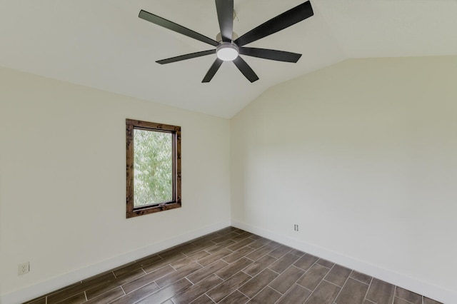 spare room with lofted ceiling, ceiling fan, and dark hardwood / wood-style floors