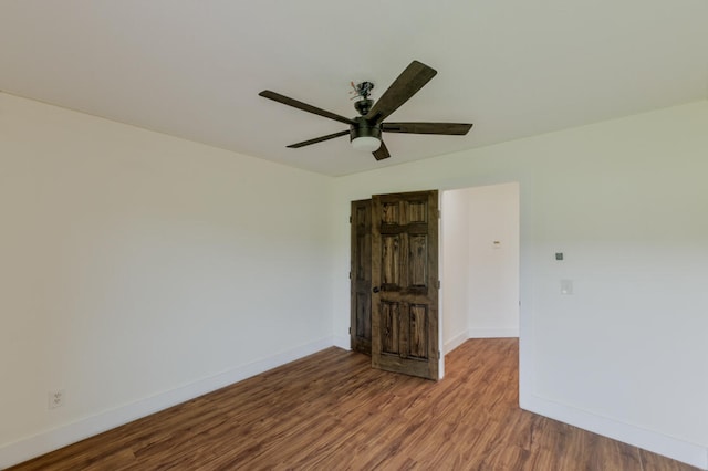 unfurnished bedroom featuring ceiling fan and hardwood / wood-style floors