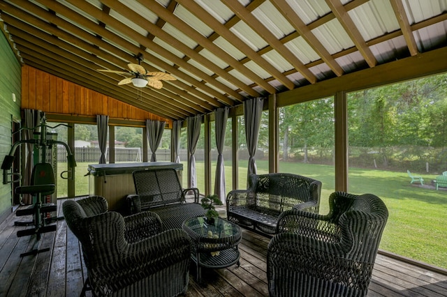 sunroom / solarium with vaulted ceiling and ceiling fan