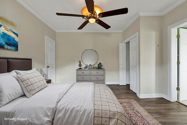 bedroom with ceiling fan, crown molding, and dark wood-type flooring