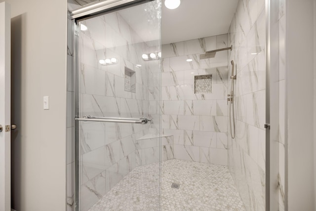 bathroom featuring an enclosed shower