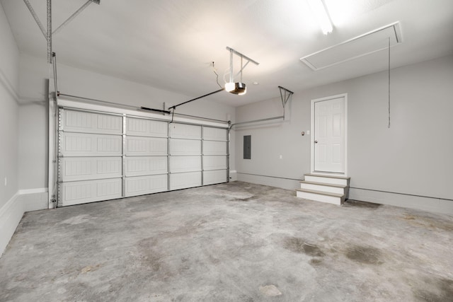 garage featuring electric panel and a garage door opener