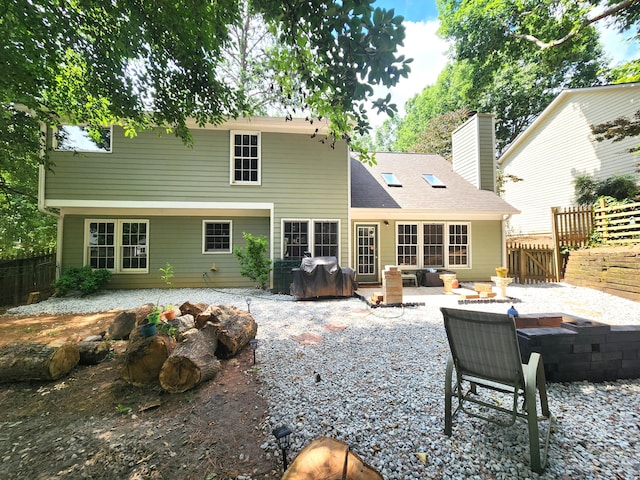 back of house featuring a patio area