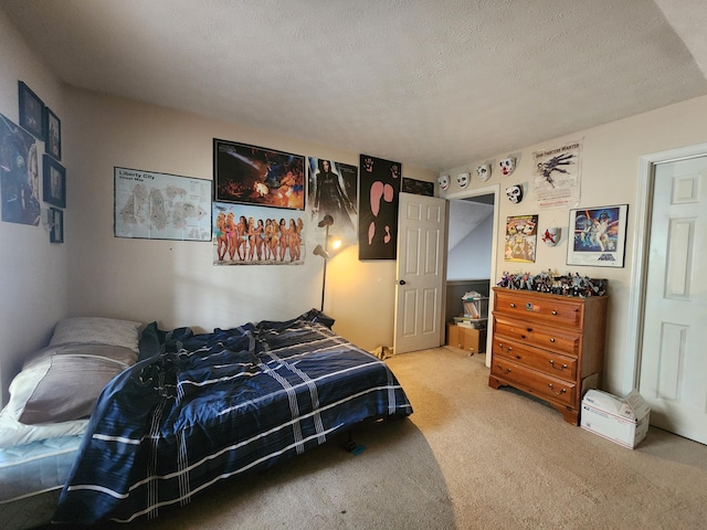 carpeted bedroom with a textured ceiling