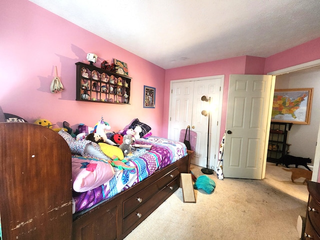 carpeted bedroom with a closet