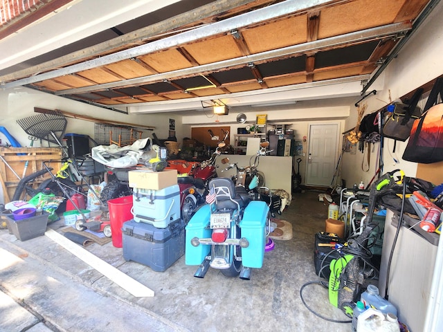 garage featuring a garage door opener