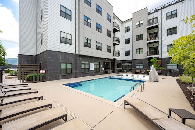 view of pool with a patio area