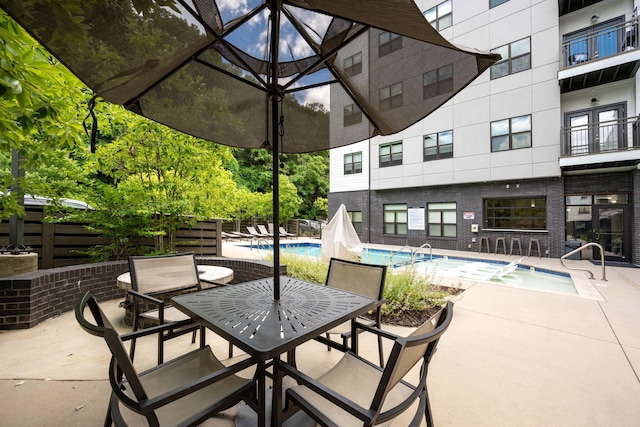 view of patio / terrace with a community pool