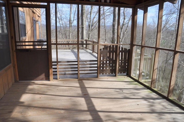 unfurnished sunroom with a healthy amount of sunlight