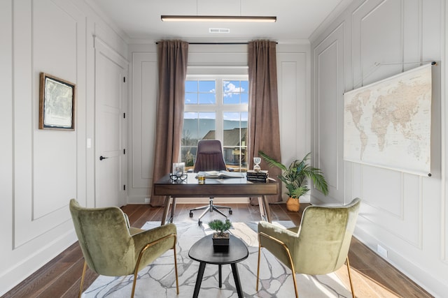 home office featuring ornamental molding and dark wood-type flooring