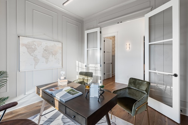 office area with ornamental molding and wood-type flooring