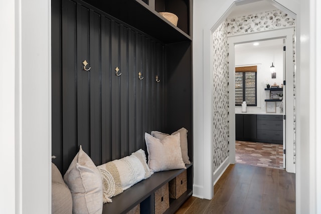 mudroom with dark wood-type flooring