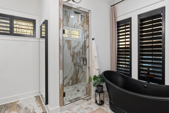 423 Sun Valley Rd Unit 702, Chattanooga, TN 37419 - full bathroom featuring a marble finish shower, marble finish floor, a freestanding bath, and baseboards
