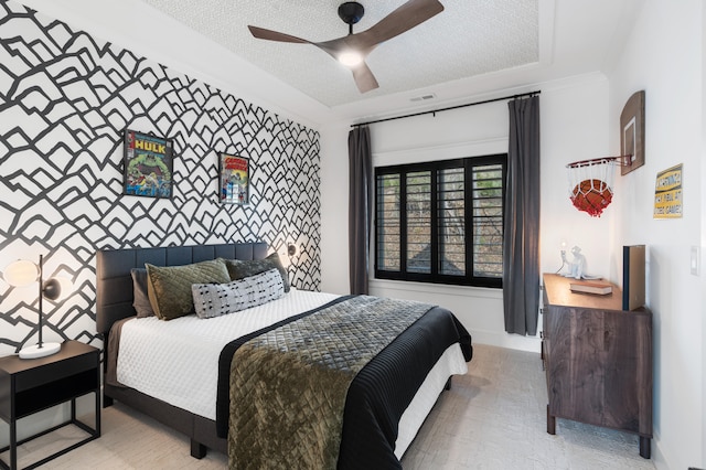 bedroom featuring a textured ceiling and ceiling fan