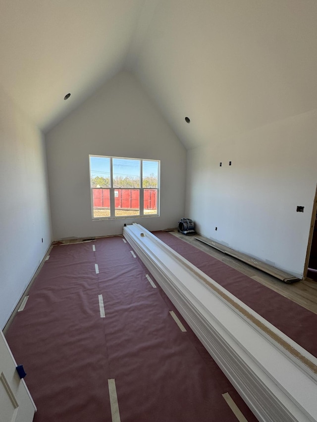 bonus room with vaulted ceiling