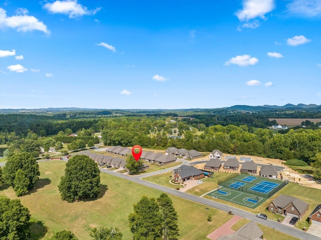 aerial view with a wooded view