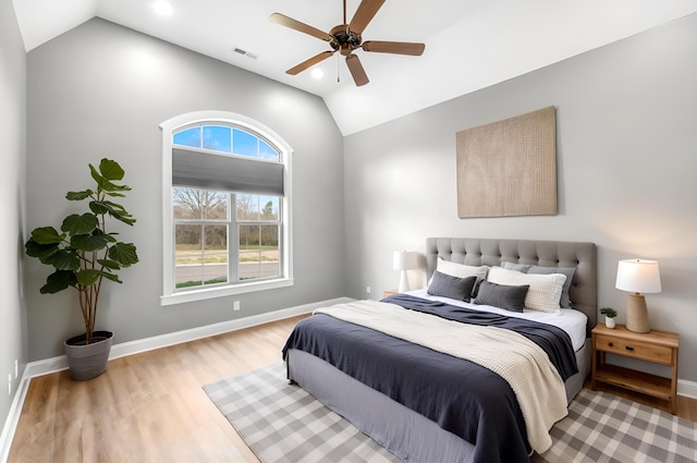 207 Zion Cove Ln, Englewood, TN 37329 - bedroom with vaulted ceiling, multiple windows, light wood-type flooring, and baseboards