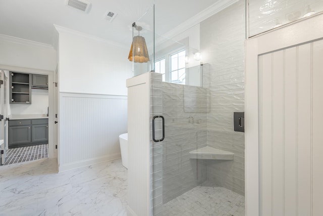 bathroom with vanity, ornamental molding, and independent shower and bath