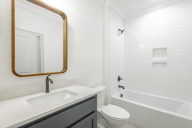 full bathroom with ornamental molding, vanity, toilet, and tiled shower / bath combo