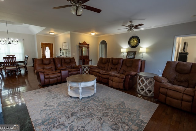 living room featuring ornamental molding, dark hardwood / wood-style floors, and ceiling fan with notable chandelier