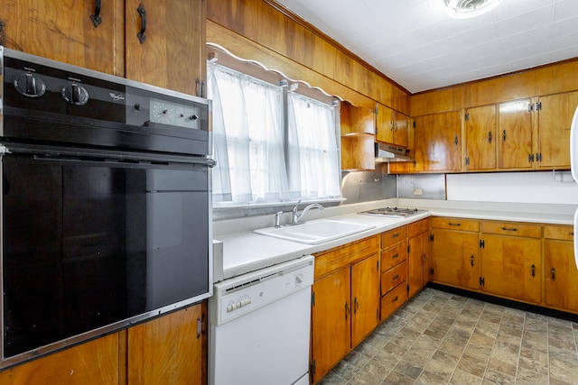 kitchen with sink and white appliances