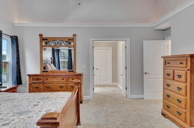 bedroom featuring light carpet and ornamental molding