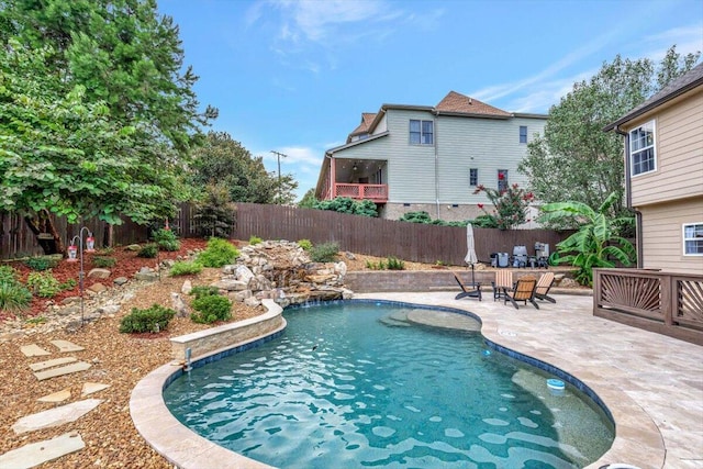 view of pool featuring a patio area