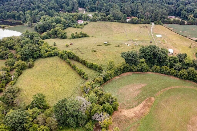 aerial view featuring a rural view and a water view