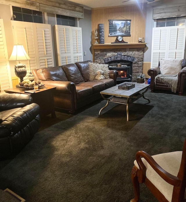 living room with carpet flooring and wood walls