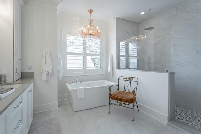 bathroom featuring vanity, ornamental molding, shower with separate bathtub, and a chandelier