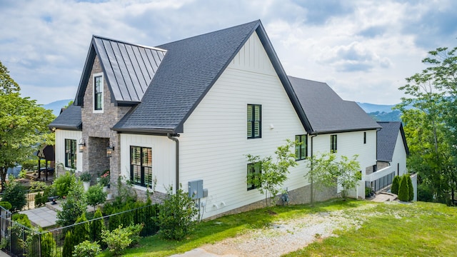 view of home's exterior with a lawn