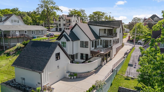 rear view of house with a balcony