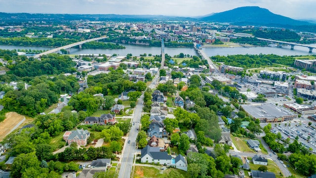 bird's eye view featuring a water and mountain view