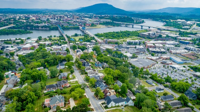 bird's eye view featuring a water and mountain view