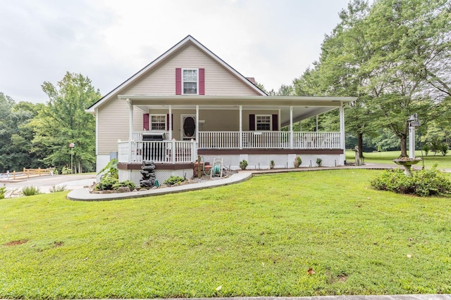 farmhouse inspired home with a porch and a front lawn