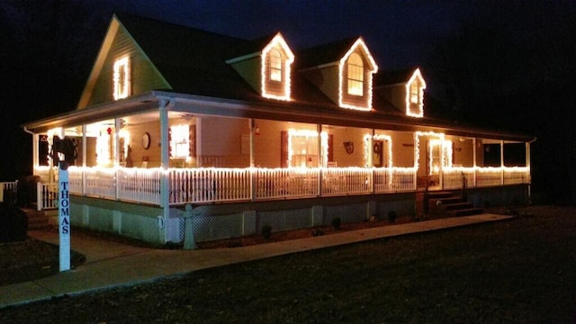 275 Old Mullins Cove Rd, Whitwell, TN 37397 - back of house at twilight with covered porch