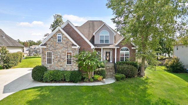 craftsman-style home with a front yard