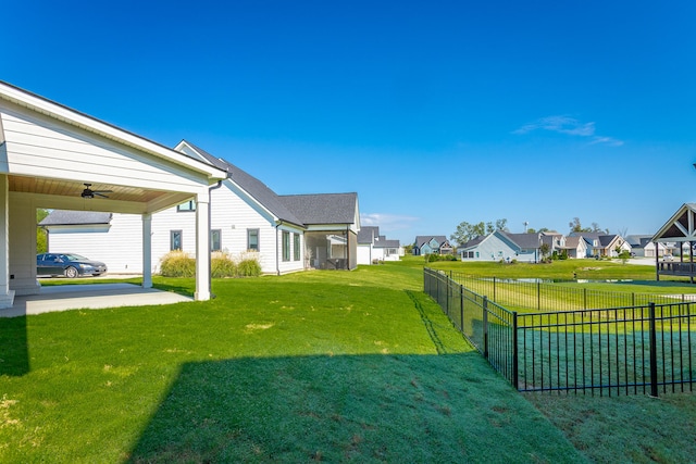 view of yard featuring a carport