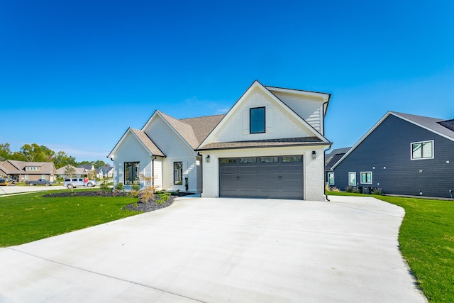 modern farmhouse style home with a front yard