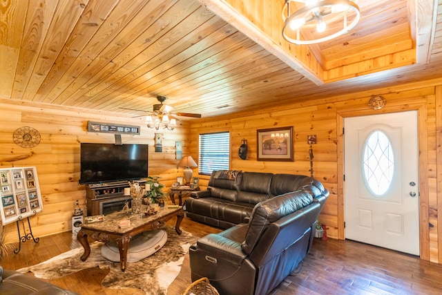 living room with a wealth of natural light, wood-type flooring, and ceiling fan