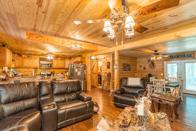 living room featuring wood walls, ceiling fan with notable chandelier, french doors, light hardwood / wood-style floors, and wood ceiling