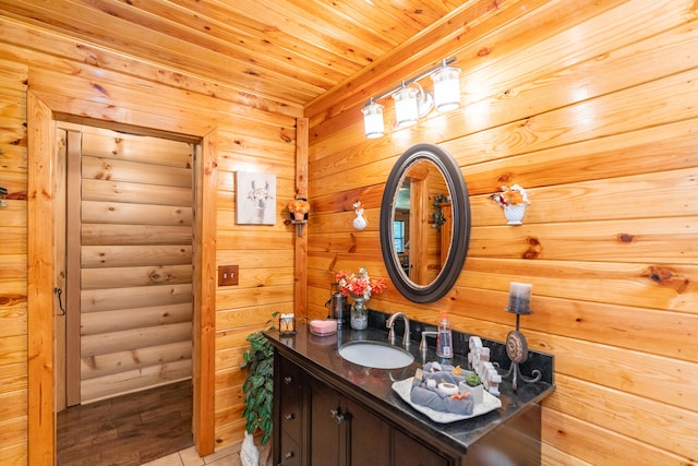 bathroom with vanity and wooden ceiling