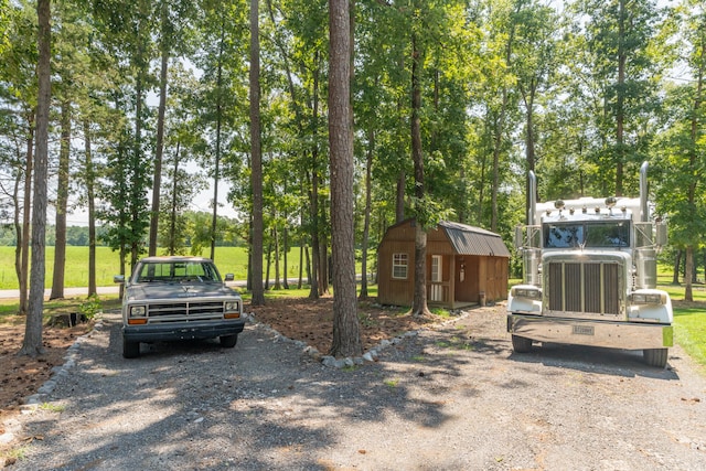 exterior space featuring a storage shed