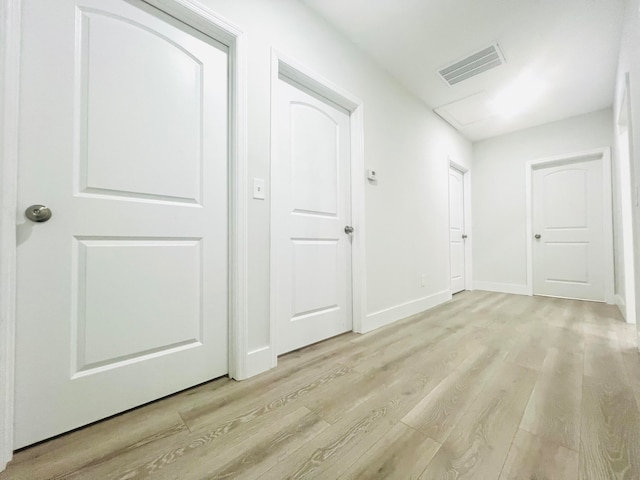 hallway featuring light hardwood / wood-style floors