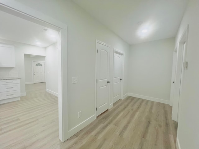 hall featuring light hardwood / wood-style floors