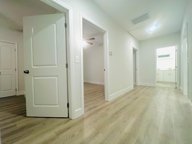 hallway featuring light wood-type flooring