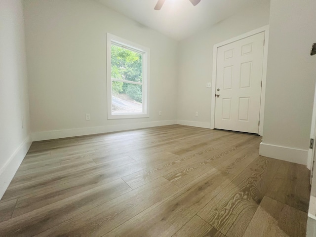 unfurnished room featuring ceiling fan and light hardwood / wood-style floors