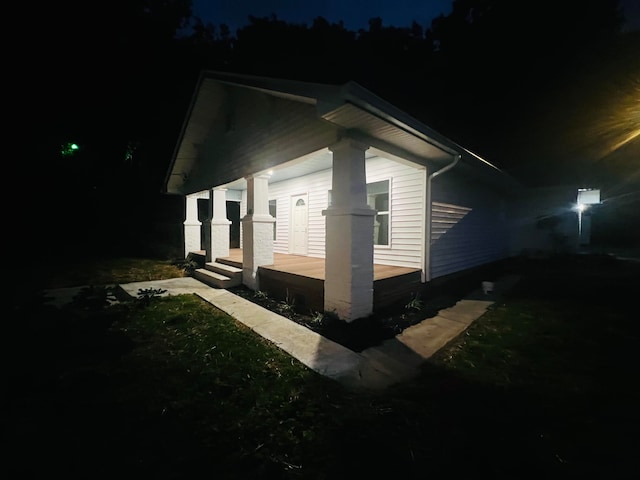 view of property exterior at twilight