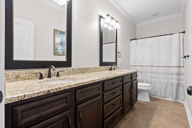 bathroom with tile patterned flooring, ornamental molding, toilet, and a sink