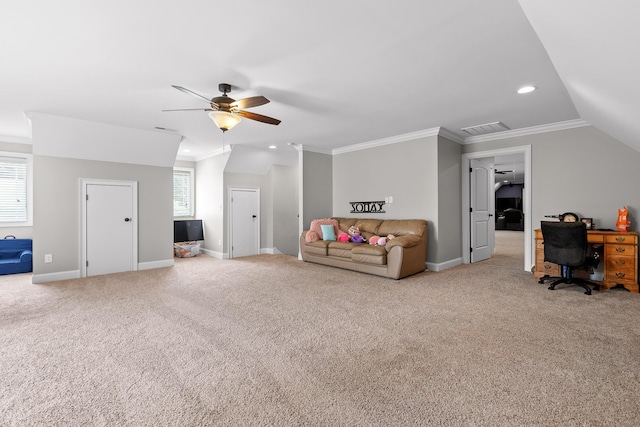 carpeted living room with a wealth of natural light, visible vents, and ornamental molding